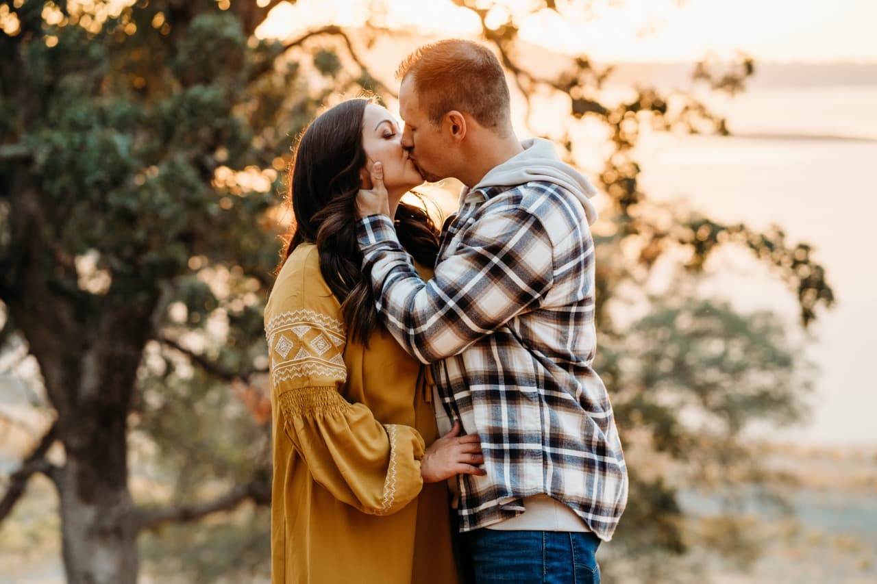 Couple embracing in a blue sweater