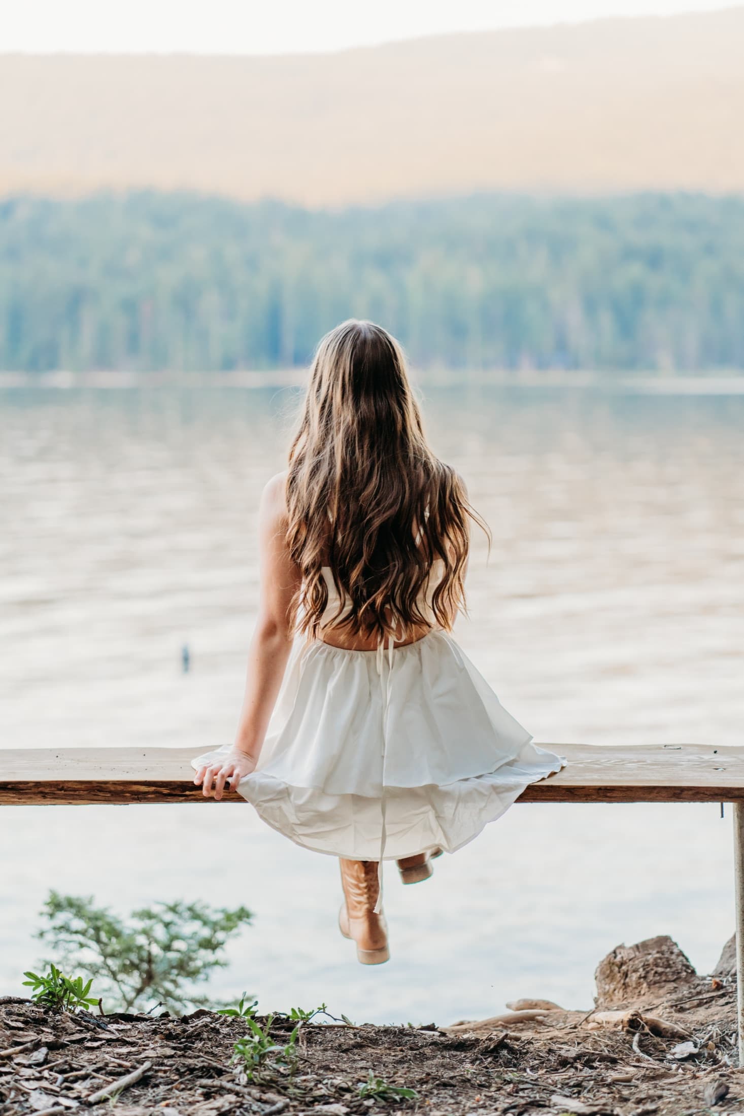 Portrait on a bench by the lake